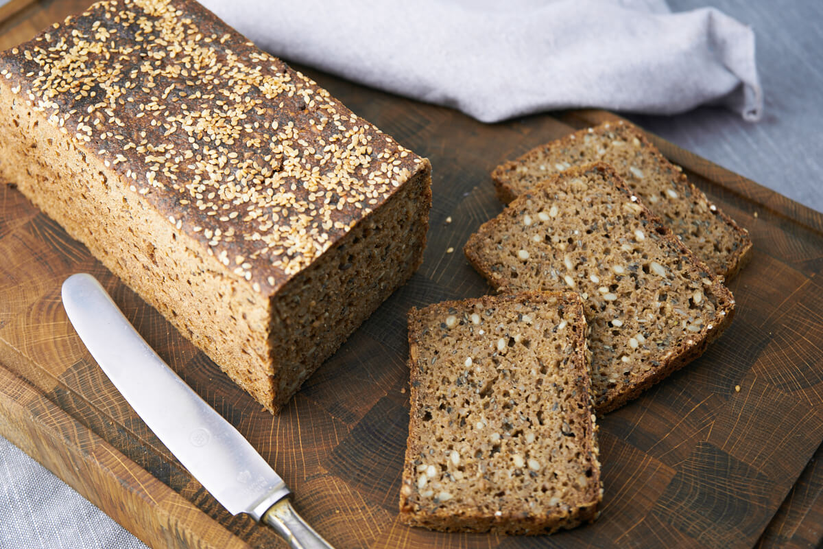 danish rye bread slices on wooden board