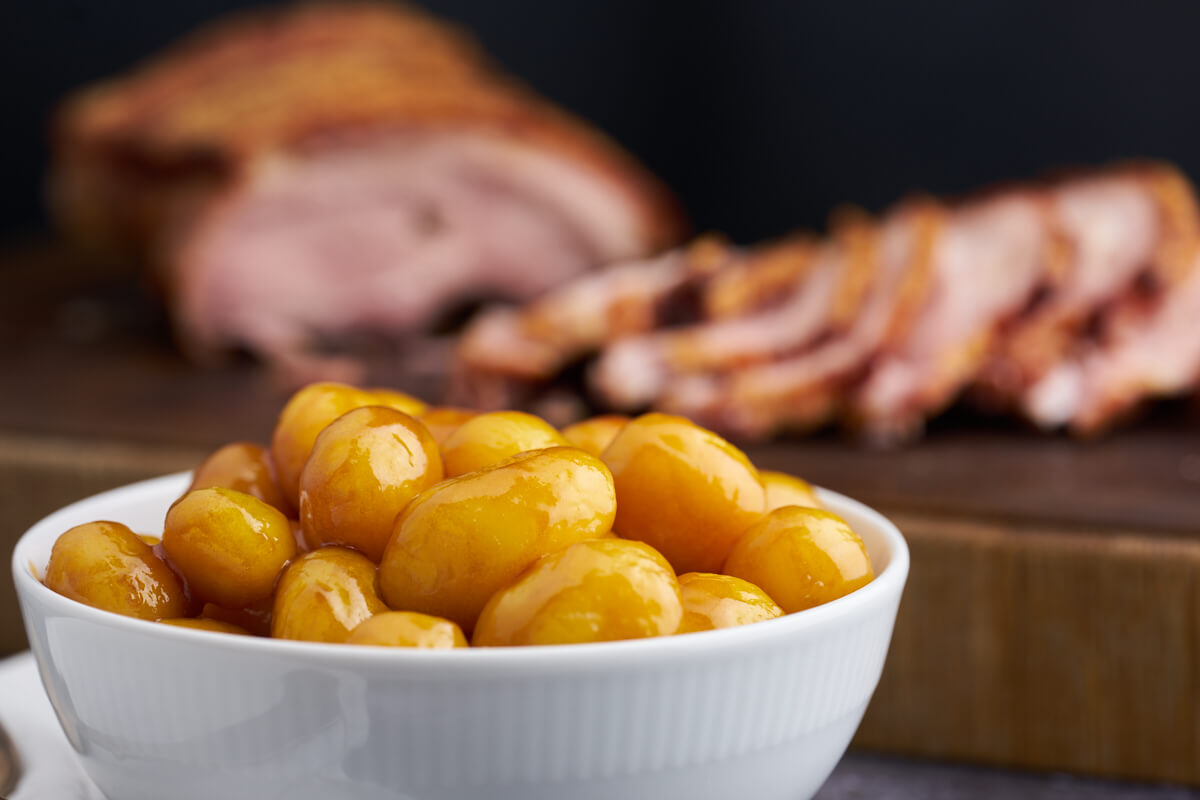 golden danish caramel potatoes served with roast pork