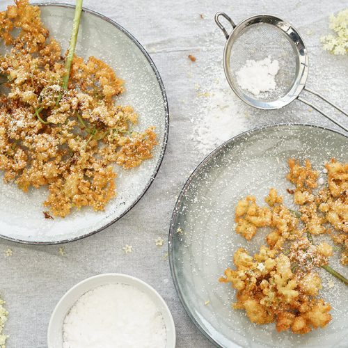 danish dessert elderflower fritters with icing sugar