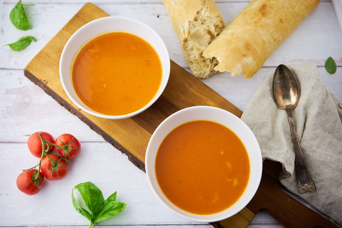 tomato soup with fresh tomatoes and bread