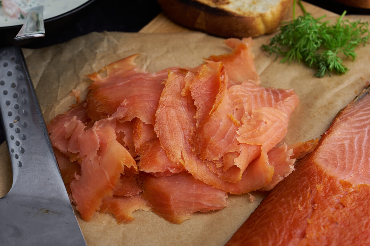 thin slices of homemade cold smoked salmon