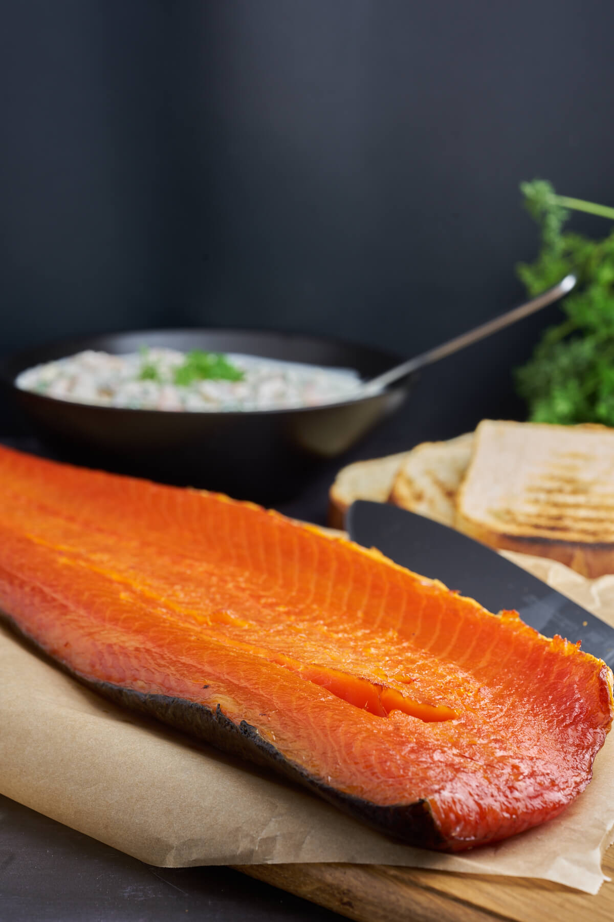 side of cold smoked salmon with bread and prawn salad