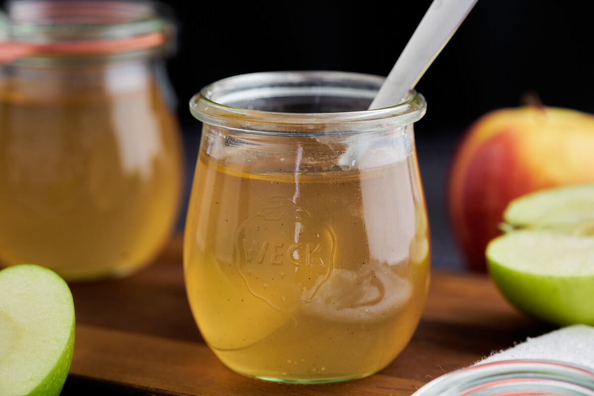 jar of apple jelly with spoon