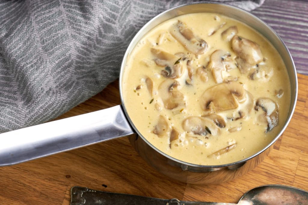 pan of white mushroom sauce