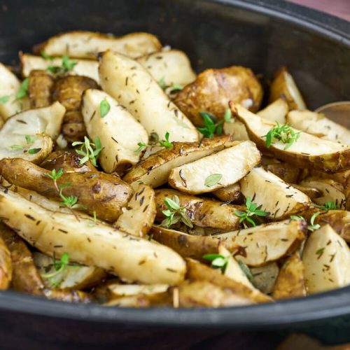 oven roasted jerusalem artichokes with thyme in dish