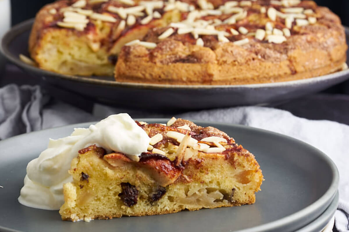 a slice of danish apple cake with cinnamon on a plate