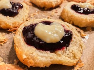 Shrovetide buns with jam and cream