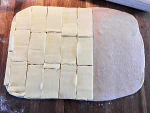 butter is wrapped in the dough for pastry pastel buns