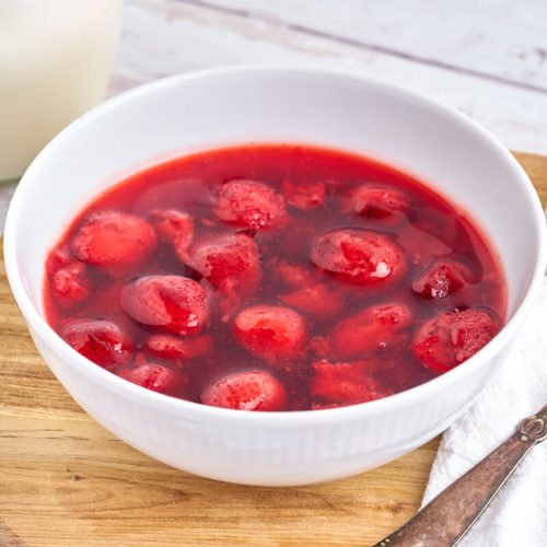 danish strawberry pudding in white bowl