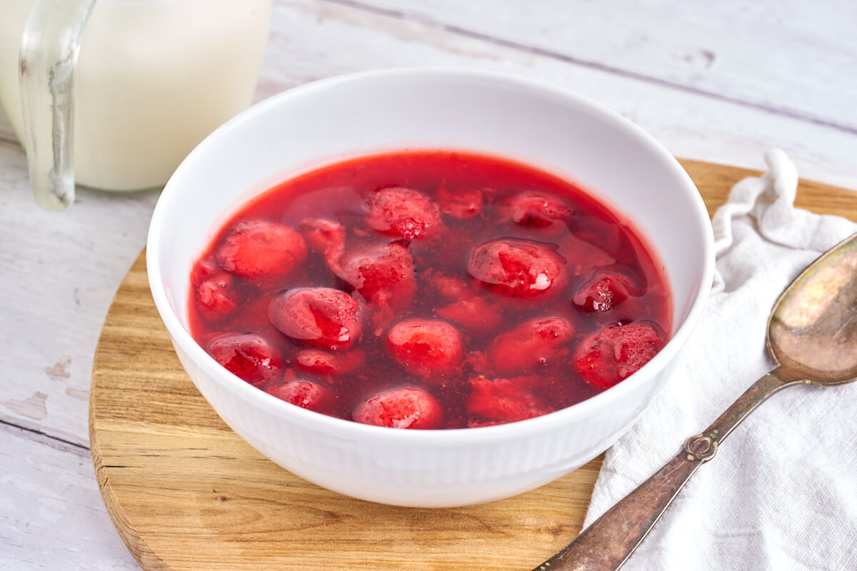 danish strawberry pudding in white bowl