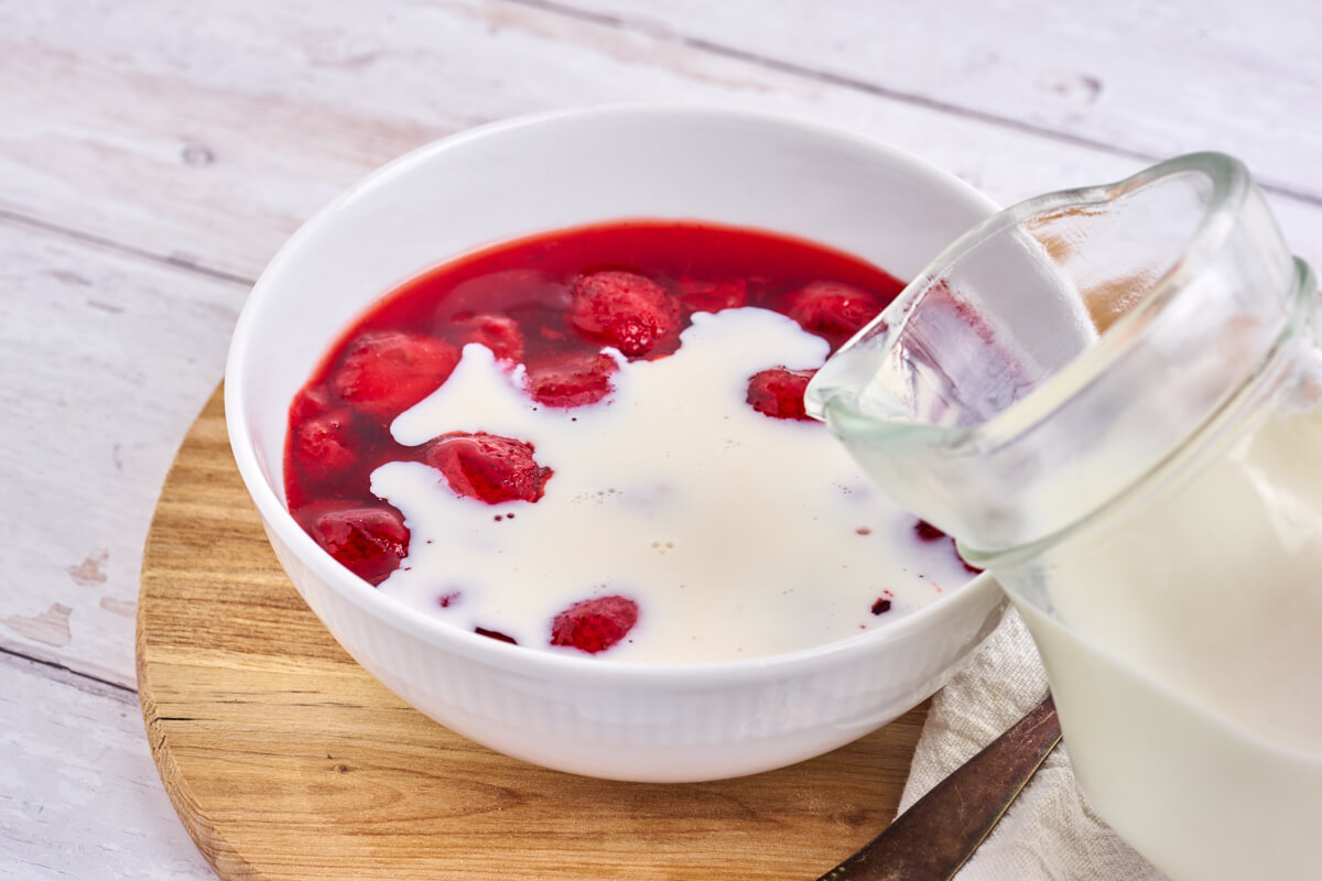 danish strawberry pudding with milk on top