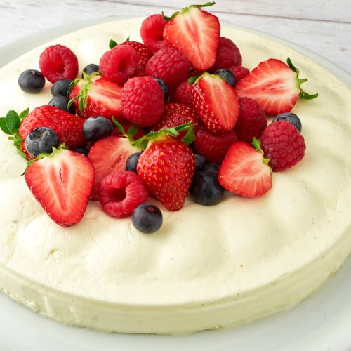 Danish vanilla cream pudding with berries on top