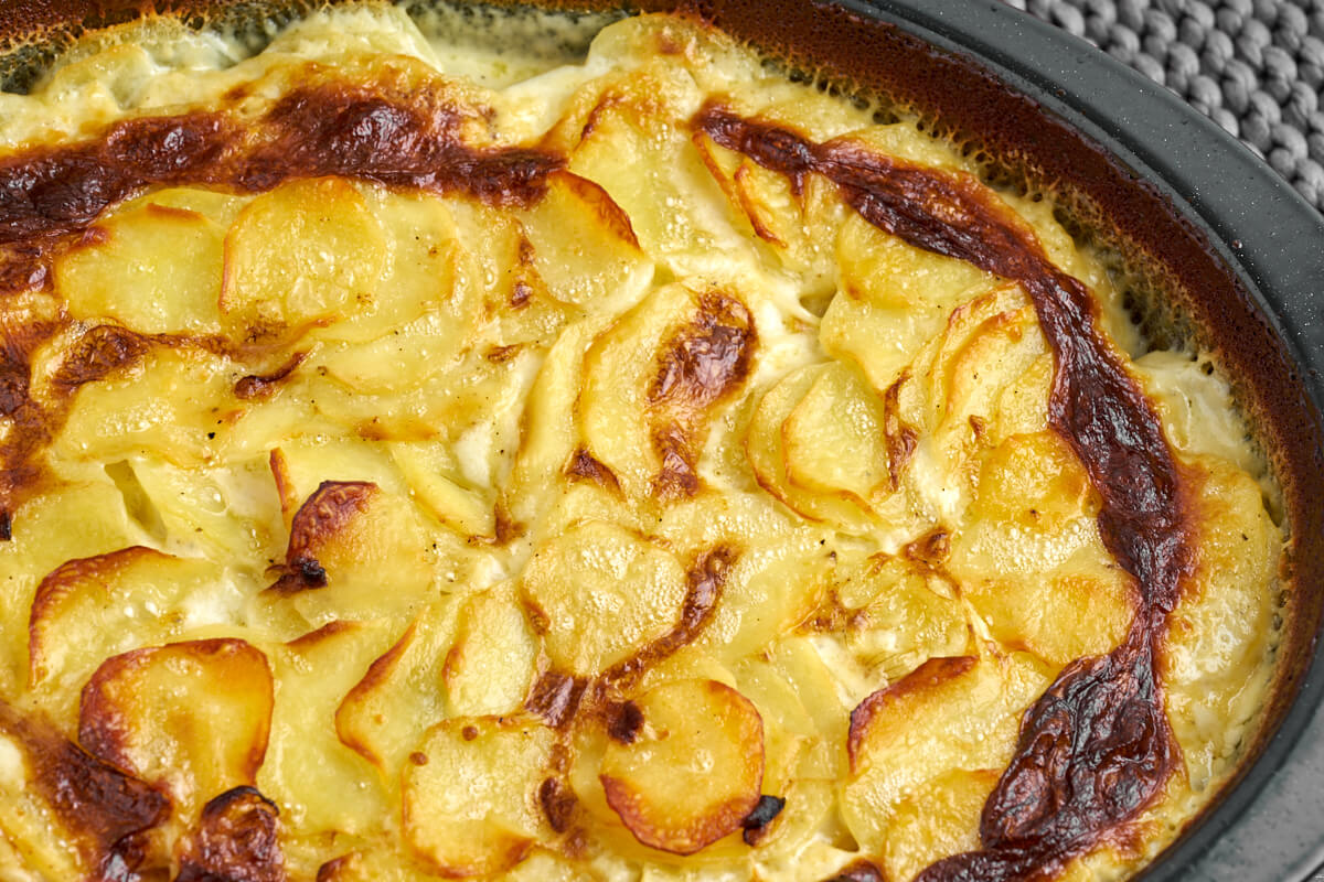 parmesan scalloped potatoes in ovenproof dish