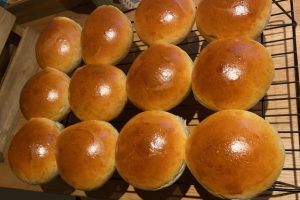 ready-baked semlor on a rack