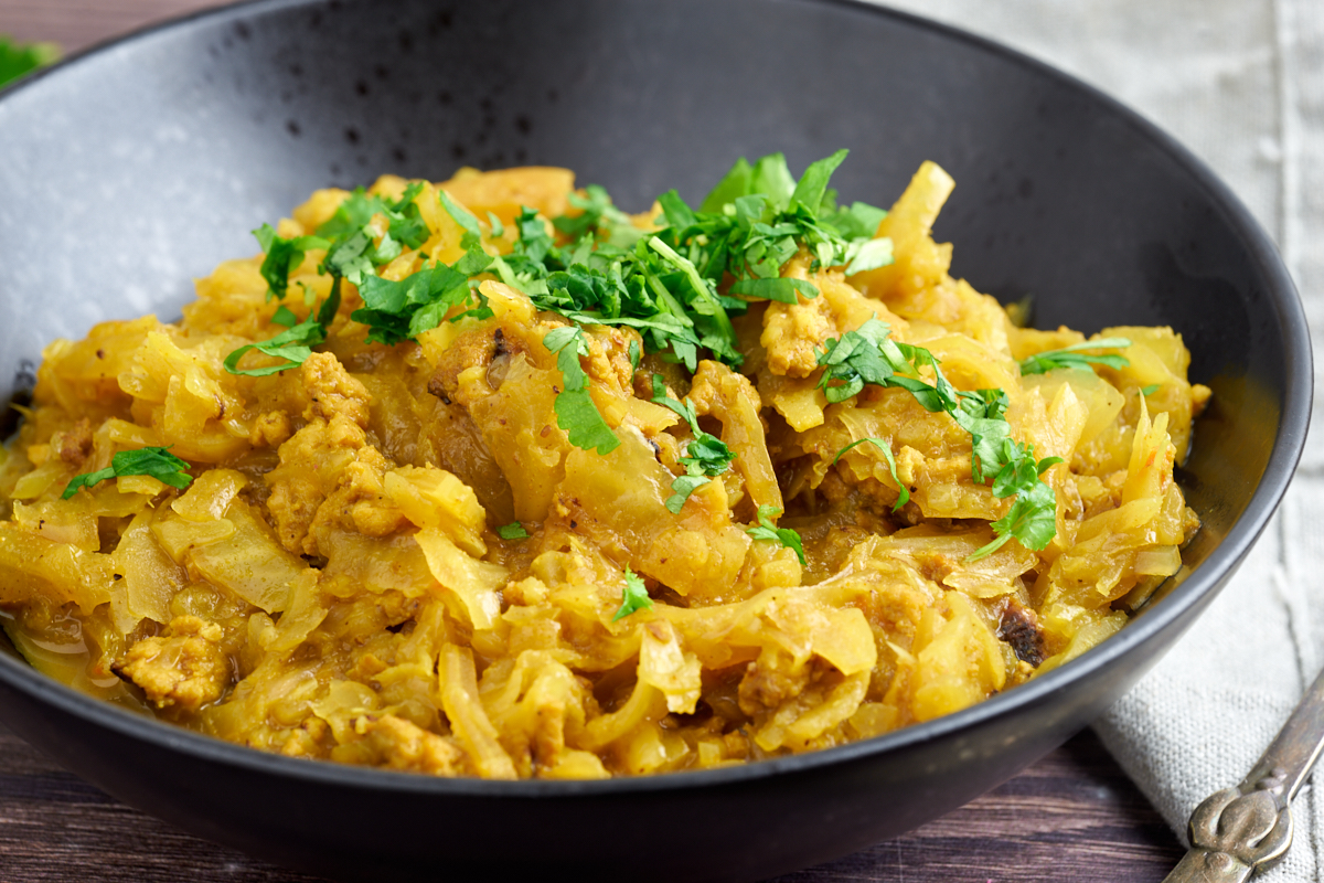 bowl with curried cabbage and chicken