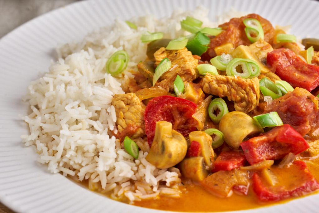 Danish turkey stew with red bell peppers and mushrooms