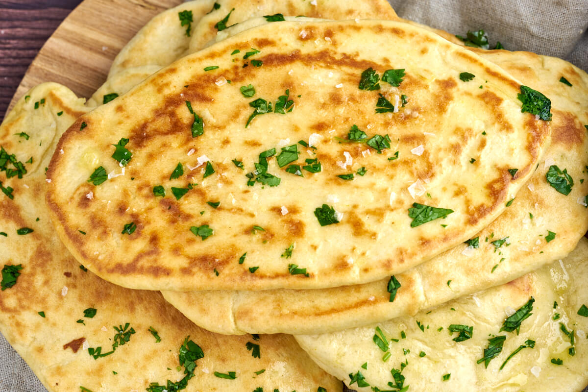 Indian naan bread with garlic and cilantro