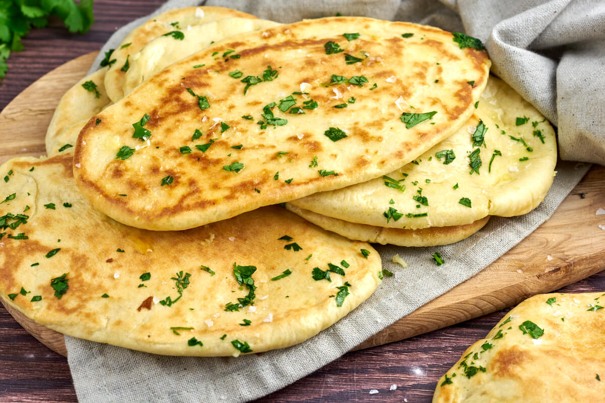 Indian garlic naan bread with cilantro