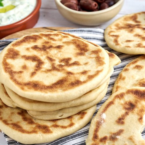 greek pita bread with tzatziki and olives