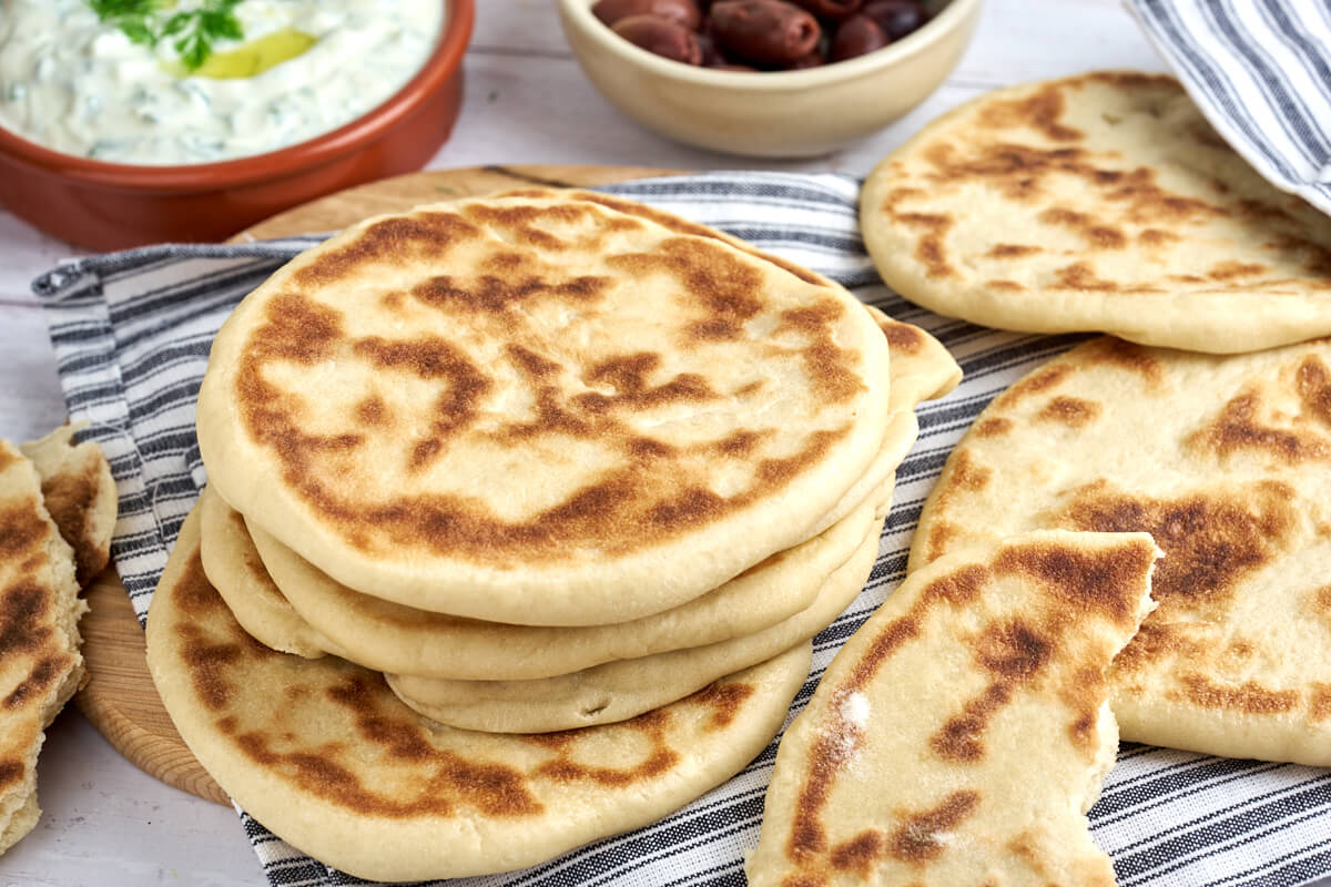 greek pita bread with tzatziki and olives