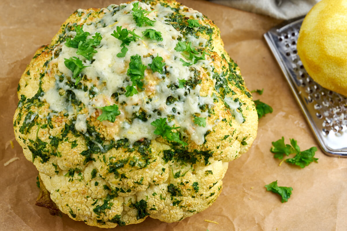 whole baked cauliflower with parsley and lemon