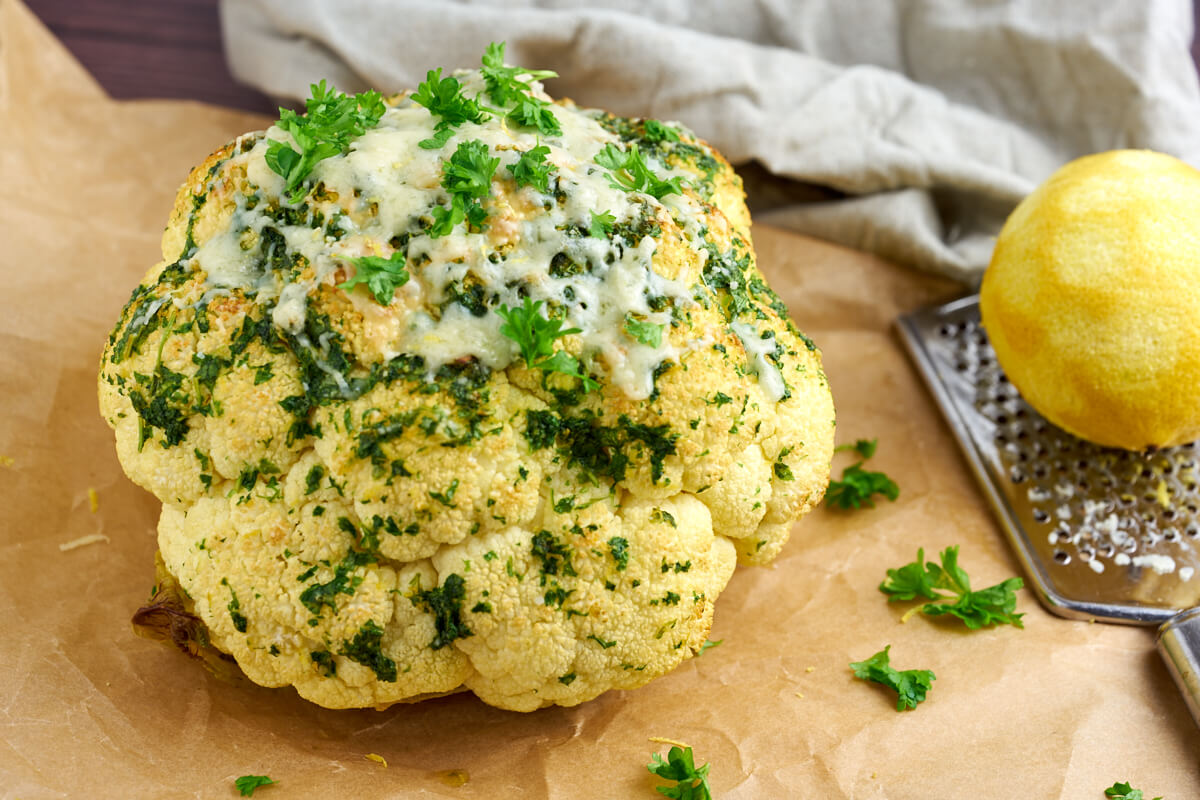 Whole roasted cauliflower with parsley and lemon and cheese