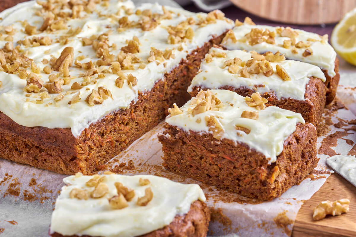 danish rectangular carrot cake with cream cheese frosting and walnuts