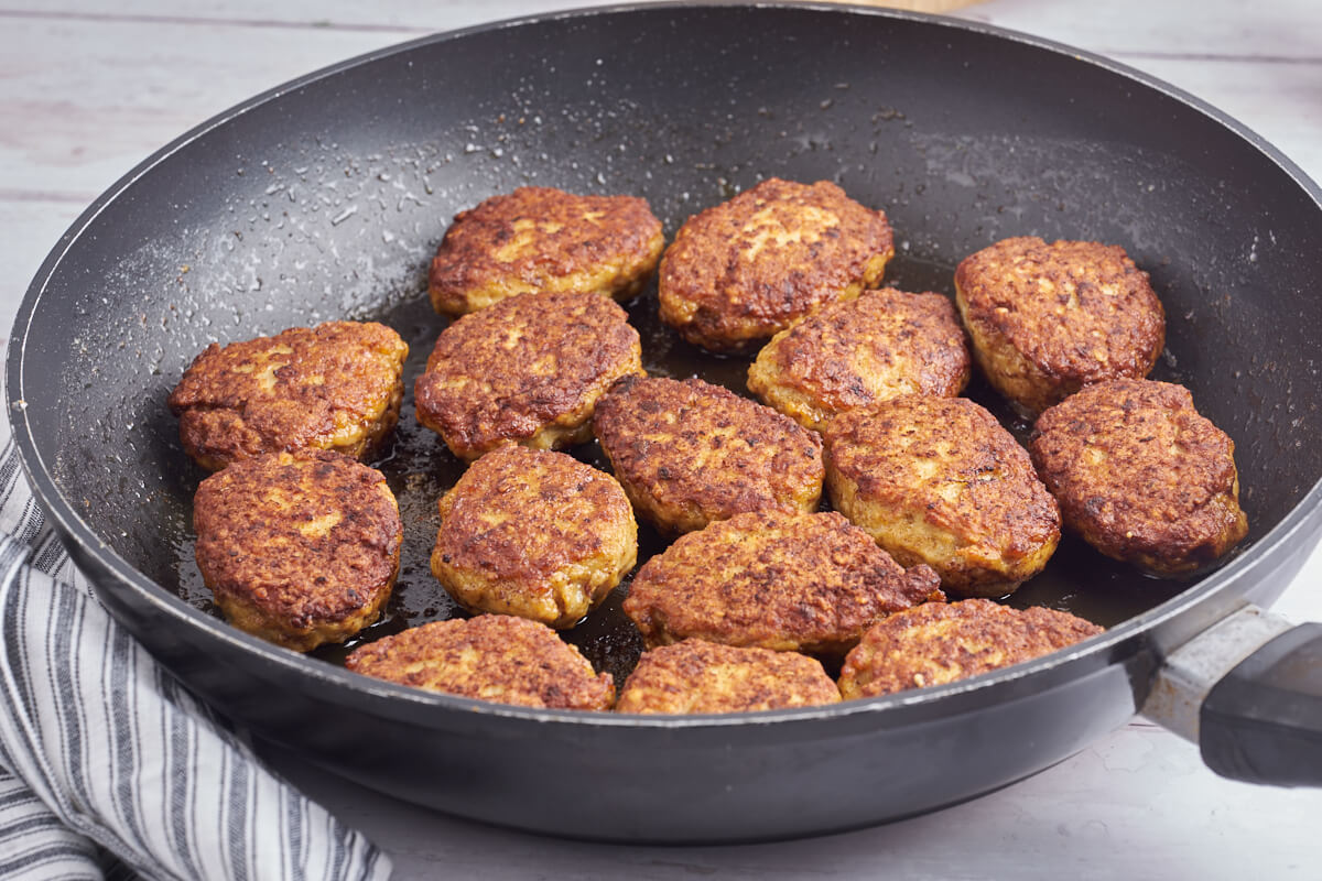 danish chicken meatballs in frying pan