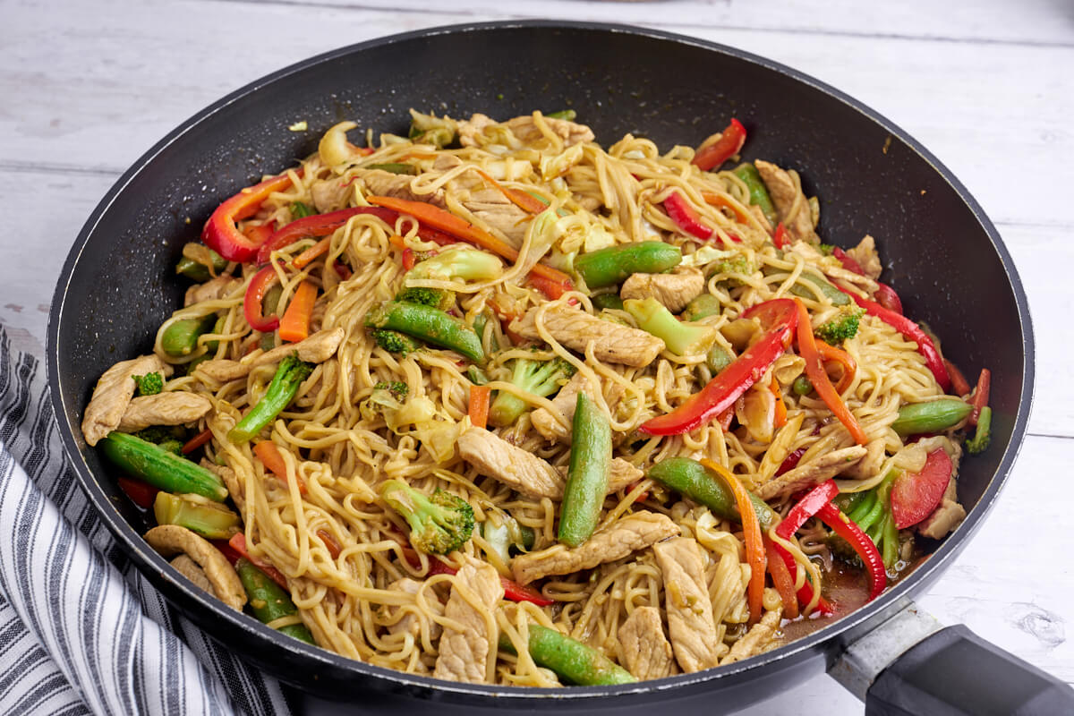 frying pan with pork lo mein