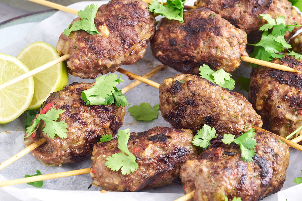 kofta kebab skewers with lime and cilantro