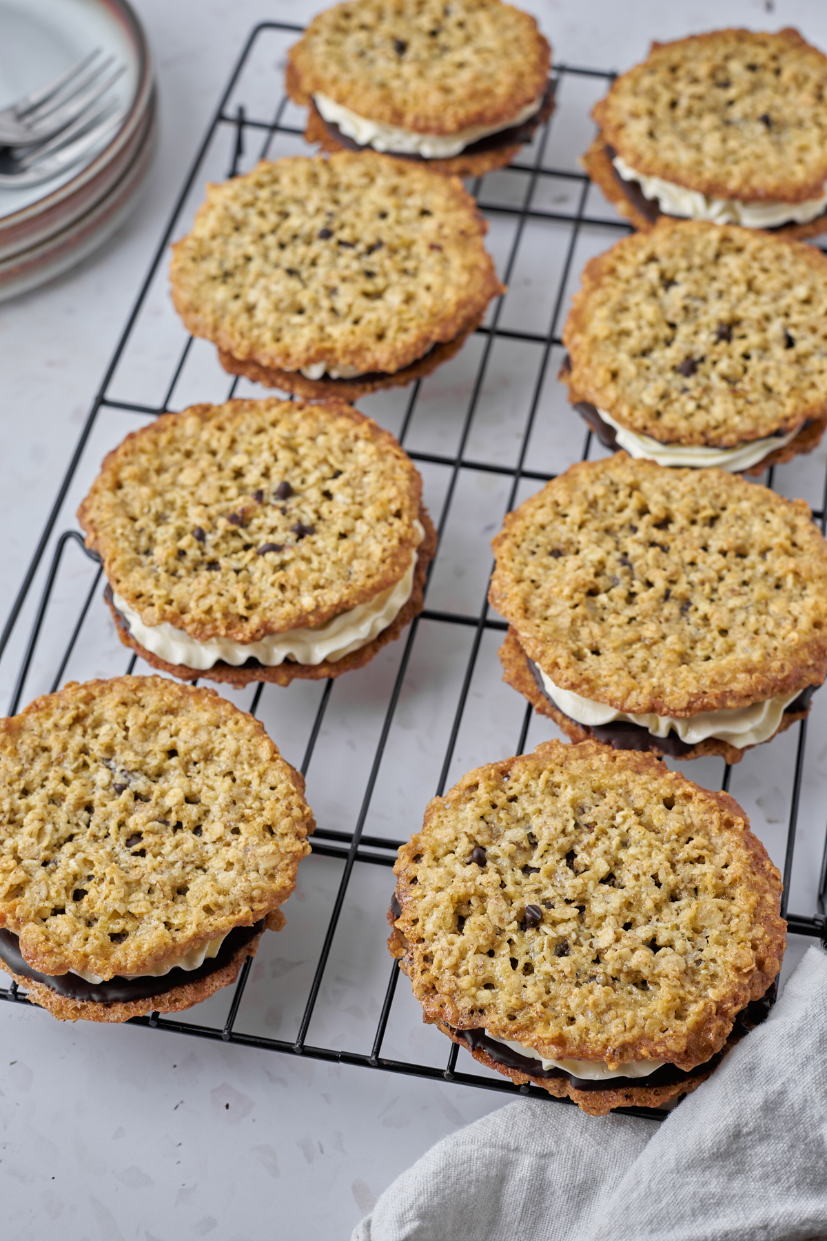 oatmeal sandwich cookies on baking rack