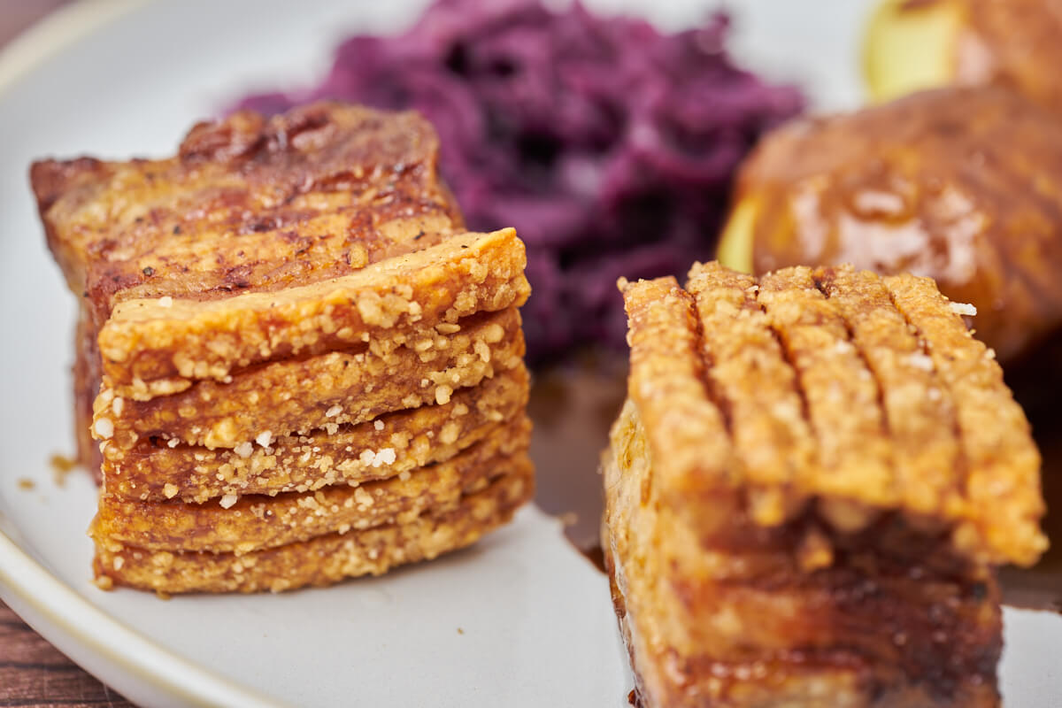 pork belly with crispy crackling served with danish red cabbage potatoes and gravy