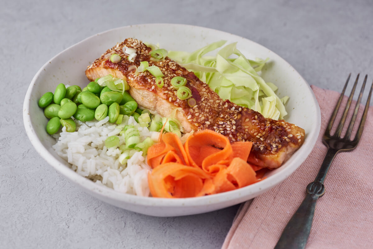 salmon rice bowl with soy marinaded salmon and vegetables