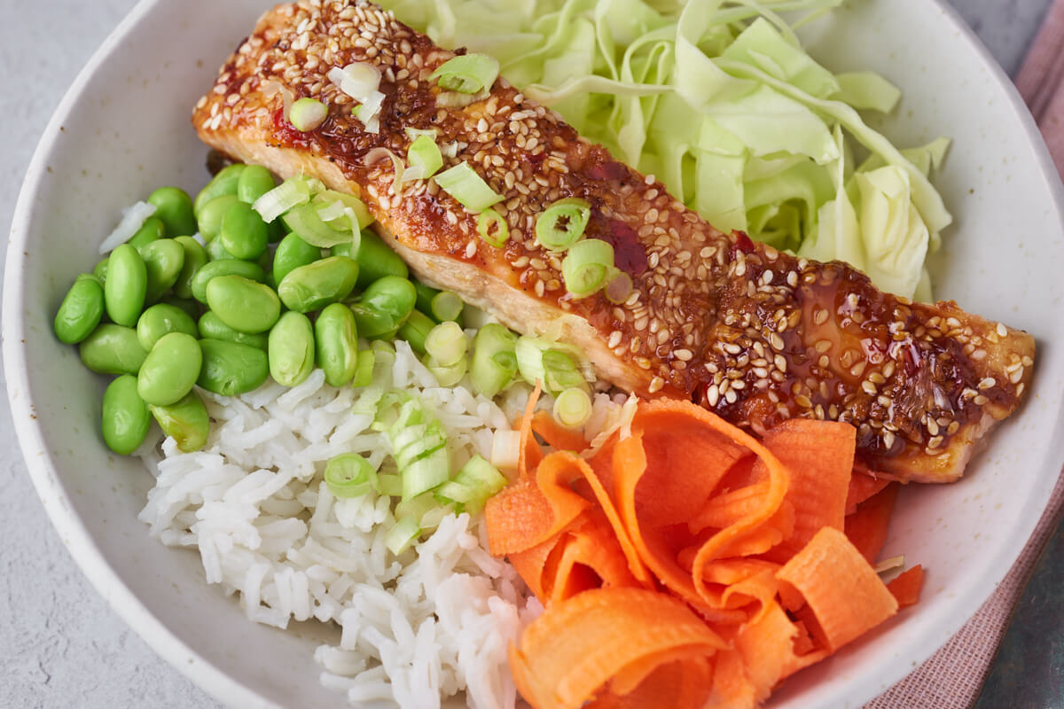 bowl with salmon, rice and vegetable