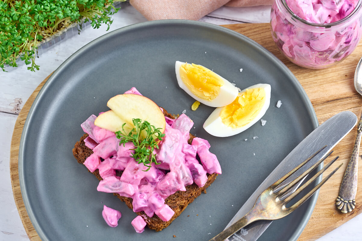 herring salad on rye bread with egg