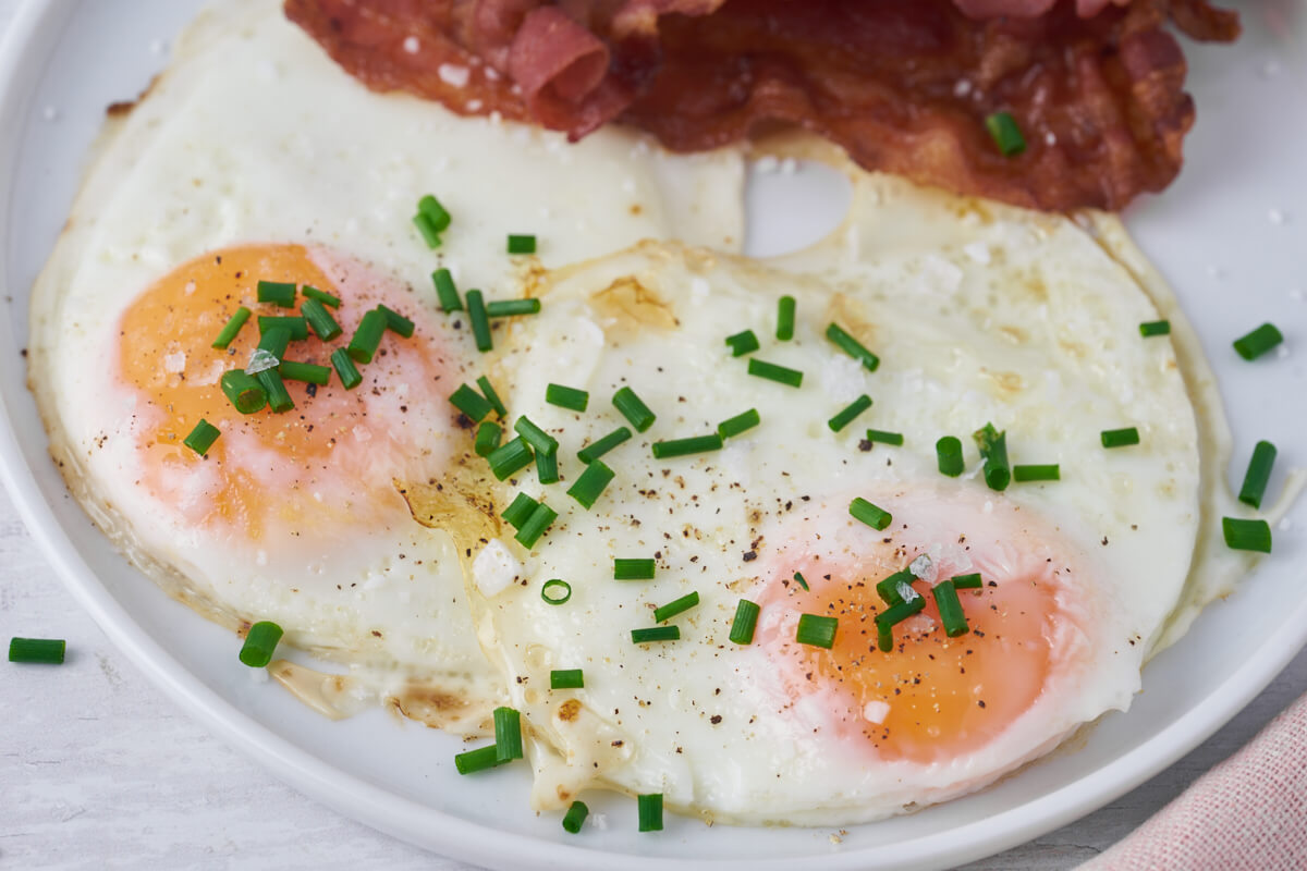 two fried eggs made in air fryer