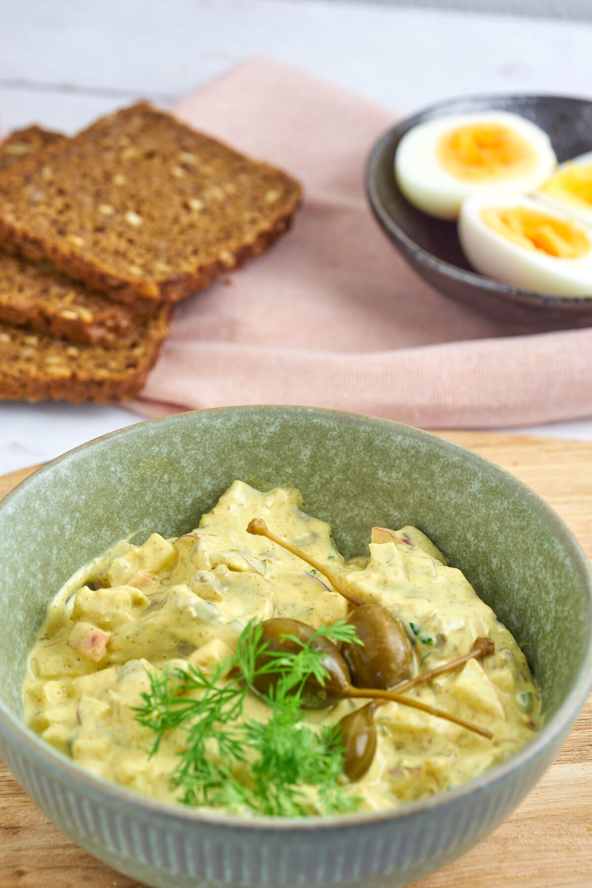 bowl with danish pickled herring in curry sauce