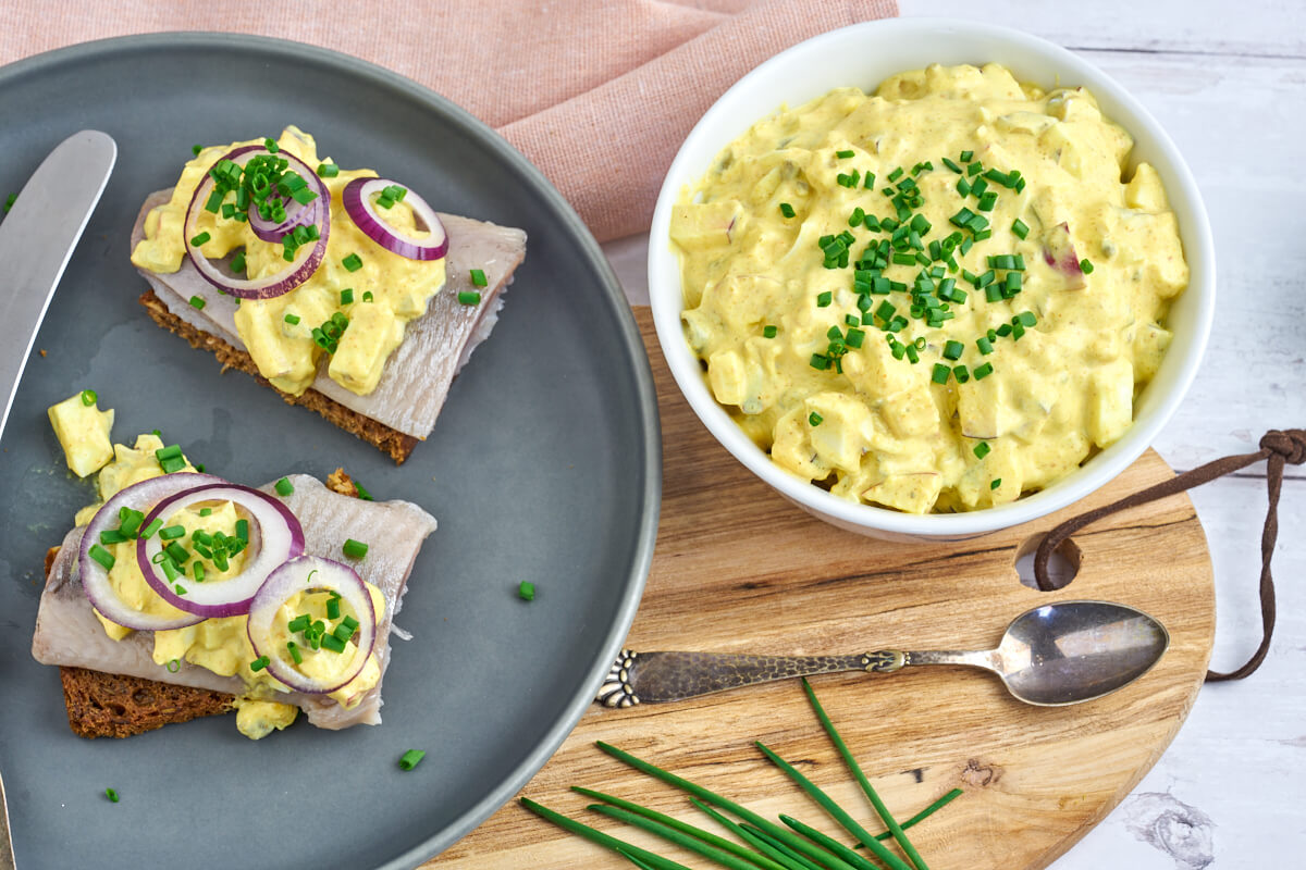 danish smørrebrød with herring and curry salad