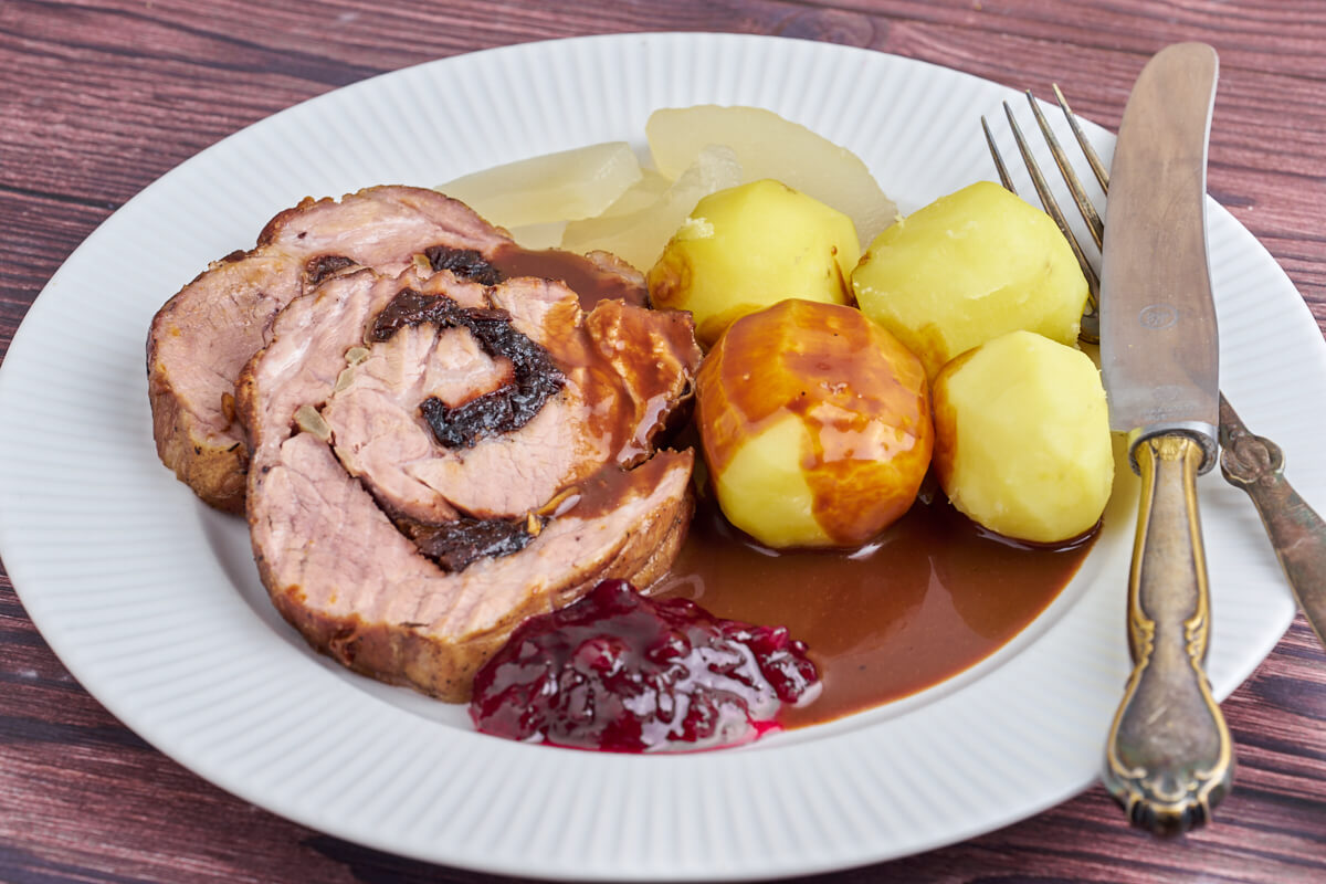 Danish rolled pork roast with potatoes and gravy