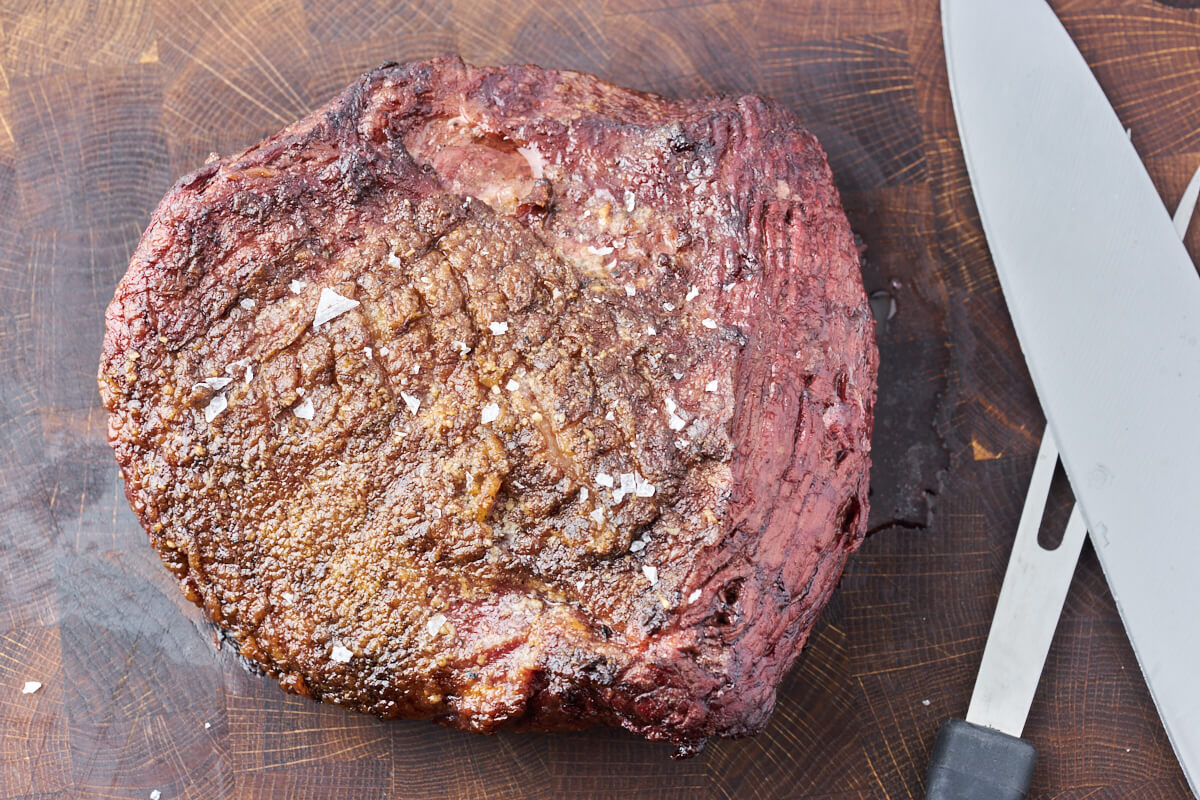 grilled top sirloin cap roast ready to be sliced