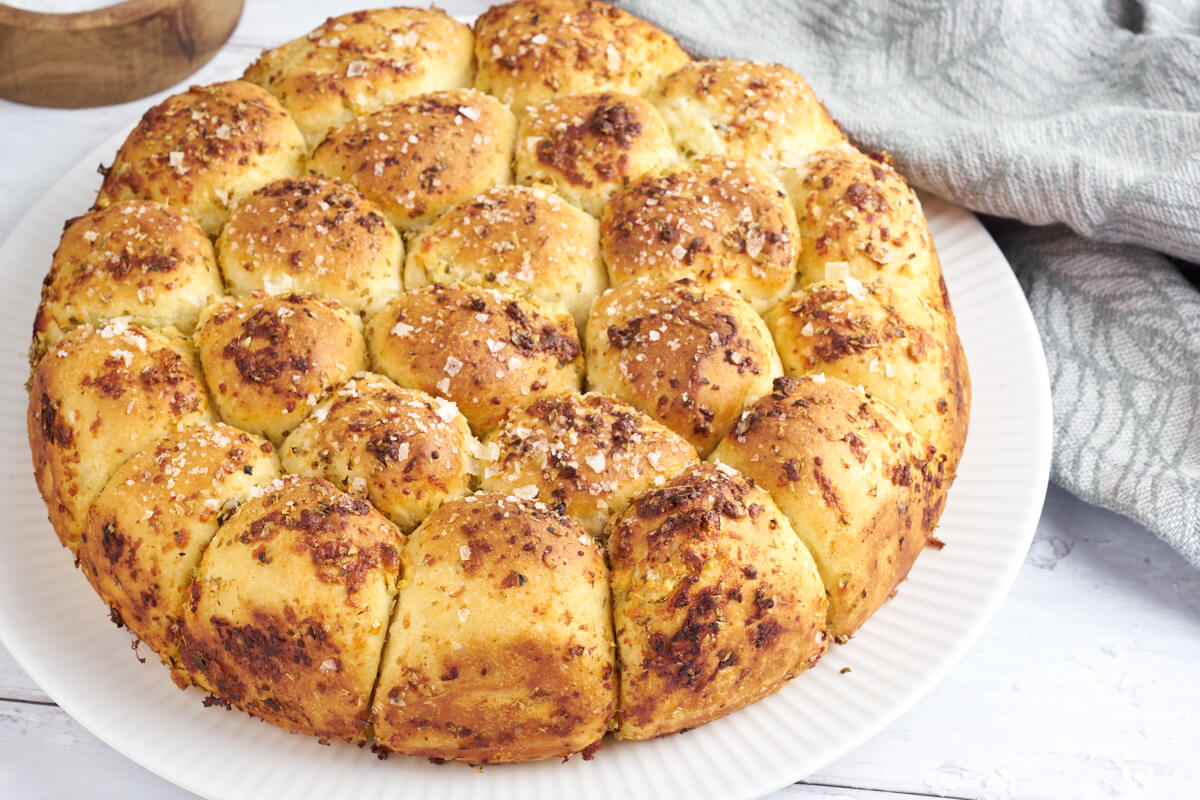 cheese stuffed pull-apart garlic bread with oregano