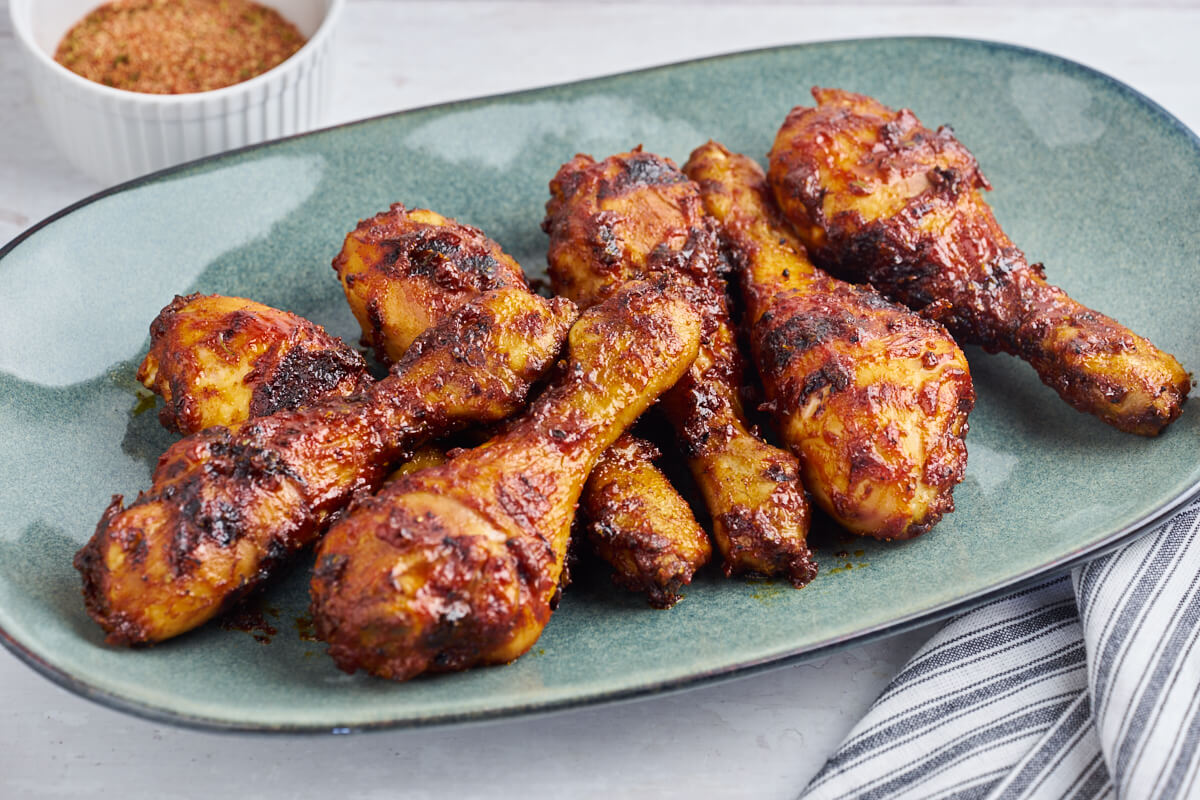 plate with grilled bbq chicken legs