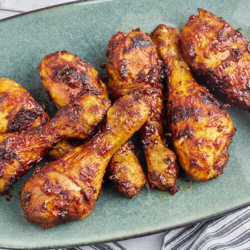 grilled BBQ chicken legs on a plate