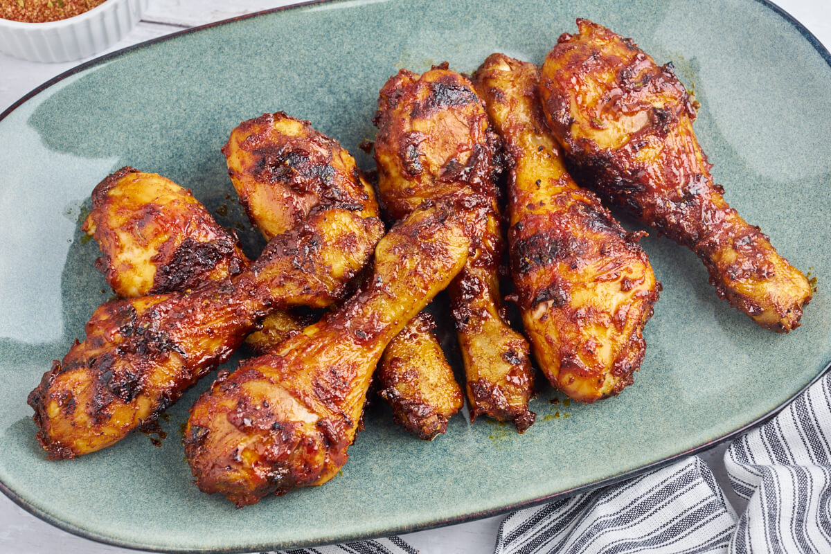 grilled BBQ chicken legs on a plate