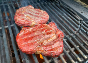 searing reverse seared ribeye steaks