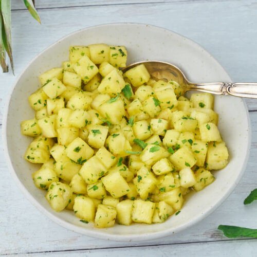 pineapple with mint sugar in dish for dessert