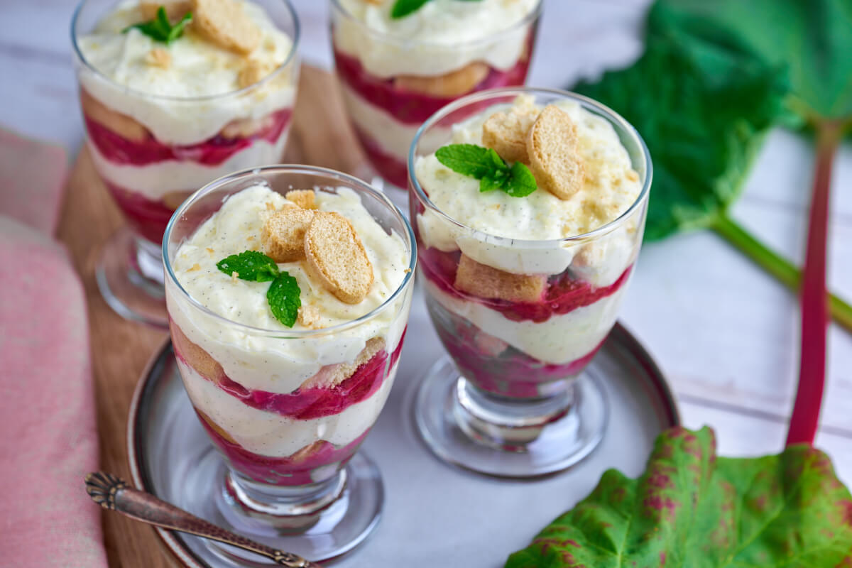 four glasses with rhubarb mascarpone trifle