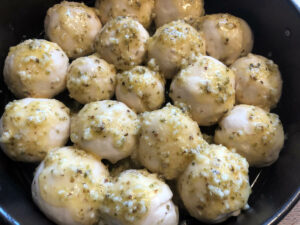 raw garlic bread before baking