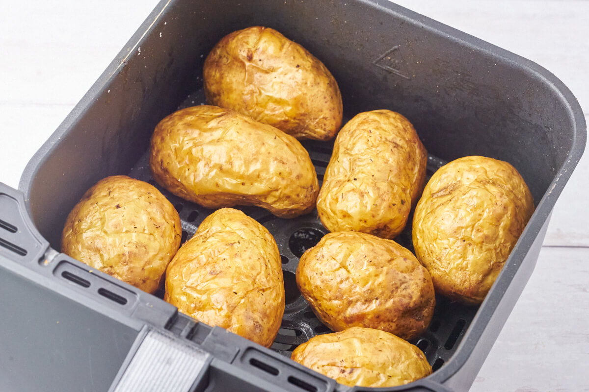 basket with perfectly cooked baked potatoes