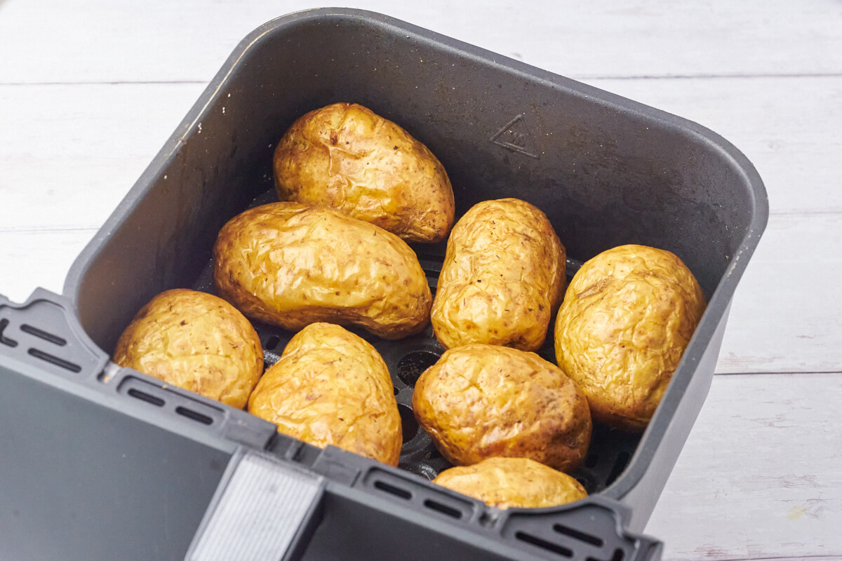 air fryer baked potatoes in air fryer basket